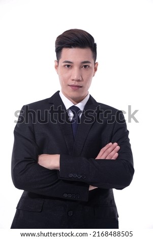 business concept, portrait of young business man with crossed arms on white background

