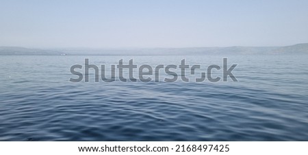 Lake and Mountains, Tranquil view of sea of galilee, Kinneret, Israel Royalty-Free Stock Photo #2168497425