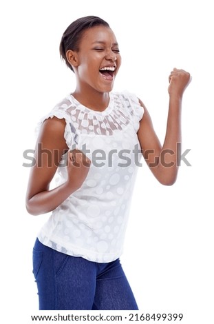 Yeah, I did it. A trendy young african woman doing a victory dance against a white background.