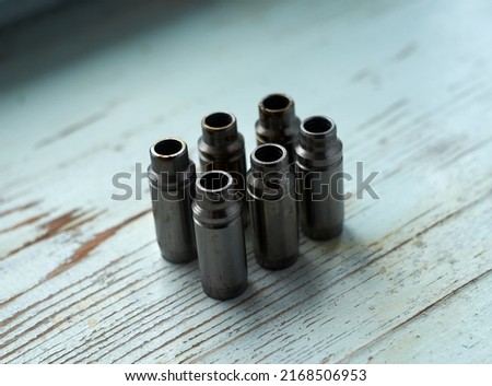 Photo of six valve guides
