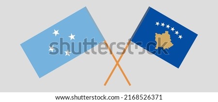 Crossed flags of Micronesia and Kosovo. Official colors. Correct proportion. Vector illustration
