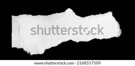 a white piece of paper on a black isolated background Royalty-Free Stock Photo #2168557509