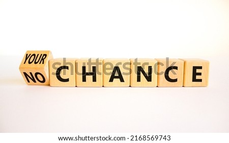 No or your chance symbol. Turned wooden cubes and changed concept words No chance to Your chance. Beautiful white table white background, copy space. Business and no or your chance concept.