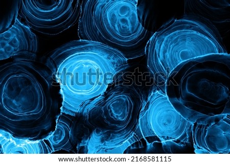 Alcohol ink background, abstract blue black ocean waves, acrylic paint sea swirl pattern, stains and blots