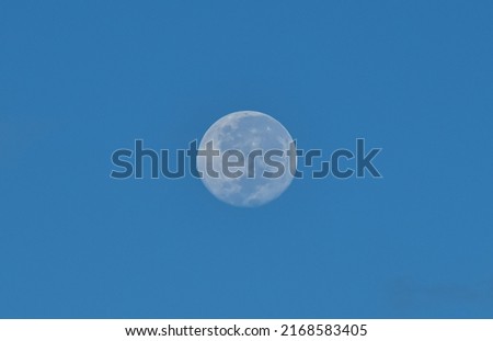 Isolated picture of full moon at Makassar blue sky