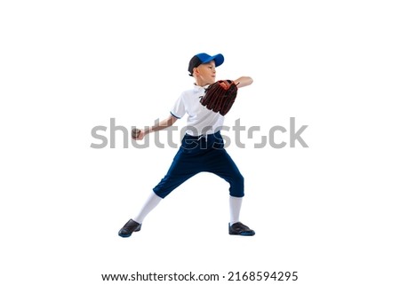Power throw. Little boy, baseball player, pitcher in blue-white uniform training isolated on white studio background. Concept of sport, achievements, studying, competition. Copy space for ad