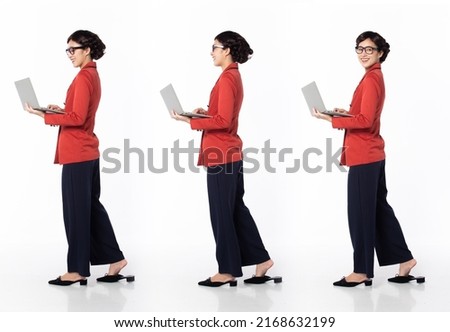 Full length 30s 40s Asian Woman programmer businesswoman, walking forward left right, wear formal blazer pants shoes. Smile Office female carry laptop computer over white background isolated