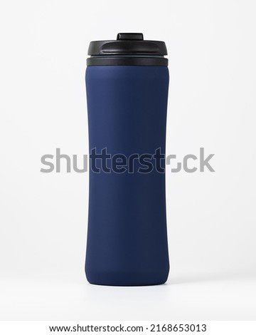 Blue thermos for drinks on a white background Royalty-Free Stock Photo #2168653013