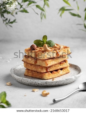 viennese waffles stacked on a plate Royalty-Free Stock Photo #2168653017