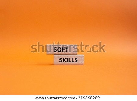 Soft skills symbol. Wooden blocks with words Soft skills. Beautiful orange background. Business and Soft skills concept. Copy space.. Conceptual image