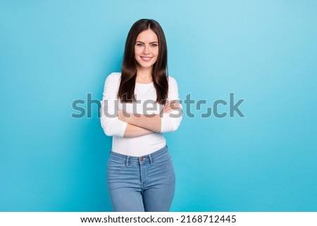 Photo of cute good mood female businesswoman with crossed arms successful lady isolated on blue color background