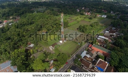 Telecommunications towers in rural areas seen from above using drones in Indonesia and Asia