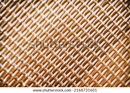 Weaving crafts in seamless patterns of old rattan wood texture brown background
