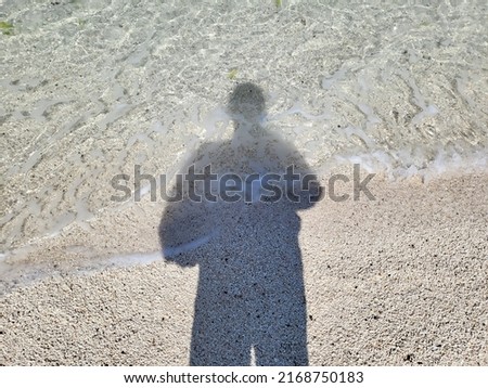 It's a shadow on the sea.
The blue sea and shadow create beautiful pictures.