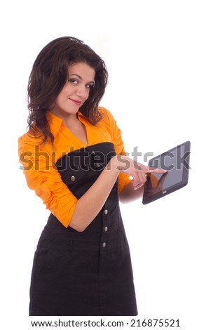 Beautiful teenage girl posing with tablet pc computer isolated on white background