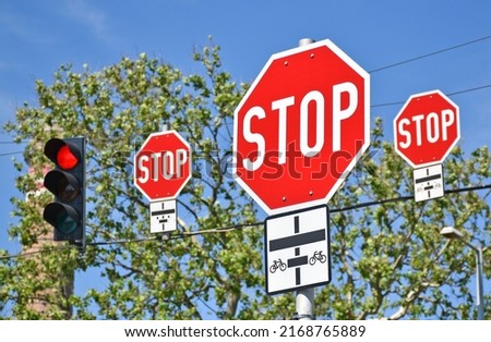 Stop signs at the road crossing