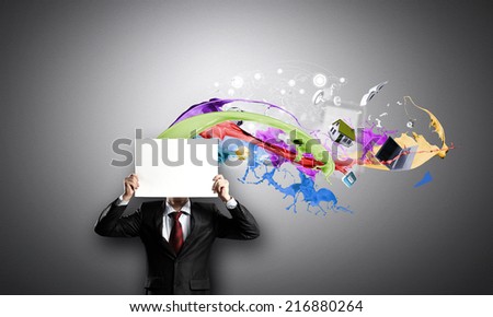 Unrecognizable businessman holding white blank paper. Place for text
