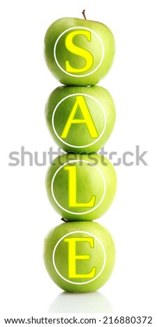 Sale concept. Ripe green apples isolated on white