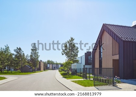 New modern block of flats in green area. residential apartment with flat buildings exterior. luxury house complex. Part of City Real estate property, condo architecture. apartment insurance concept. Royalty-Free Stock Photo #2168813979