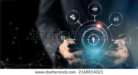 Target customer, buyer persona, customer behavior concept. Marketing plan and strategies. Personalization marketing, customer centric strategies. Businessman showing on screen to target customer. Royalty-Free Stock Photo #2168814023