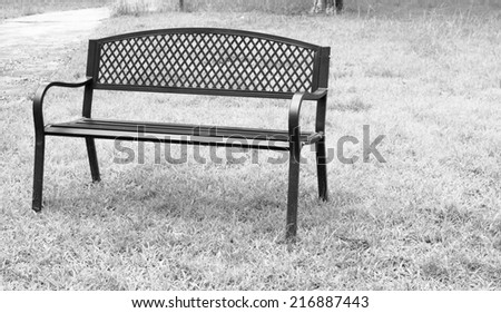 wooden park bench at the public park image.
