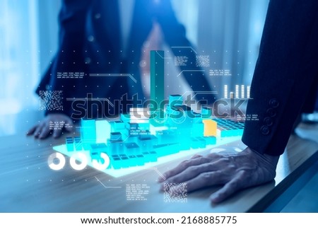 Smart city metaverse future digital world technology Ai artificial intelligence IoT, human working with 3D city building model innovation living technology make life easier. Royalty-Free Stock Photo #2168885775