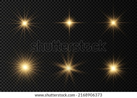 The star burst with brilliance, glow bright star, flare of sunshine with rays, yellow glowing light burst on a transparent background, yellow sun rays, golden light effect, vector illustration, eps 10 Royalty-Free Stock Photo #2168906373