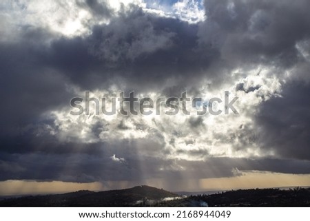 sun light shining through clouds