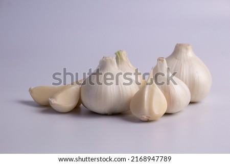 garlic on a white background, spicy spices