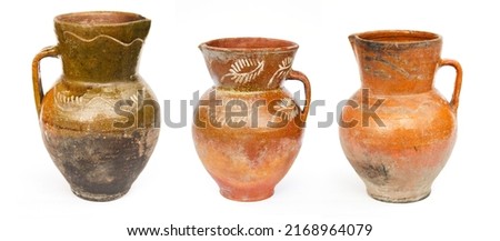 Clay jugs for water or milk. Cookware historical isolated on white background. Retro ceramic traditional Ukraine culture Royalty-Free Stock Photo #2168964079