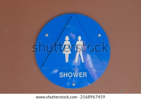 Unisex shower sign at campsite.