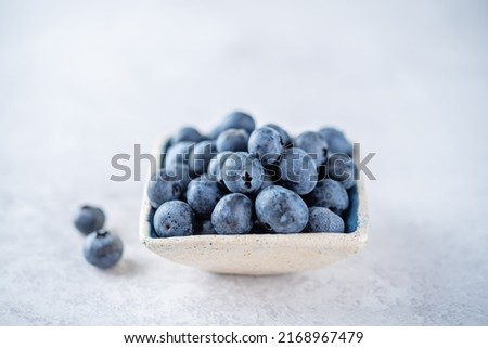 Fresh blueberry in a bowl. toning. selective focus