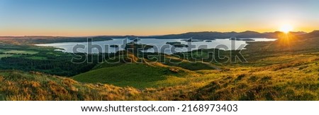 Loch Lomond at sunset in Scotland  Royalty-Free Stock Photo #2168973403