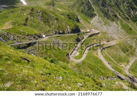 Landscape of the Transfagarasan road in summer. Located in Carpathian Mountains in Romania, Transfagarasan road is one of the most impressive mountain roads in the world. Royalty-Free Stock Photo #2168976677