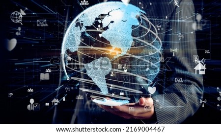 Businessman show hologram of global network communication allusive technology. Virtual augmented reality generated by 3D rendering motion graphic and animation to create futuristic HUD .
