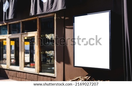 Mockup light box poster displayed on front of the restaurant, coffee shop, Promotion information for marketing announcements and details