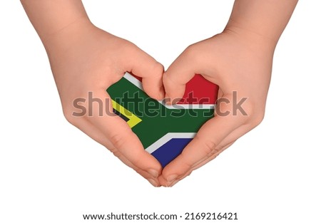 Kid's hands in heart- form. National peace concept on white background. South Africa