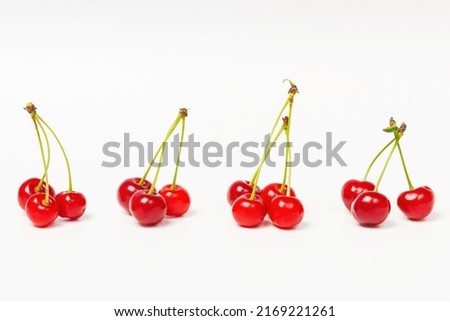 Cherry berries in different types on a white background Royalty-Free Stock Photo #2169221261