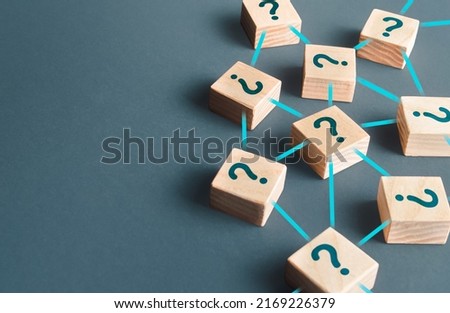 Blocks with questions connected in a network. Lots of unknown facts. Curiosity, exploration. Questions and problem solving. Technologies, extraction of knowledge and hidden information.