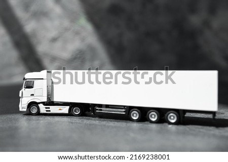 Commercial van truck on dark background. Transport and shipping