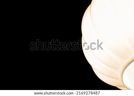 black background and white lantern. contrast photo.