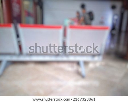 blur bokeh blur abstract background building hallway, busy atmosphere of many people. Suitable for advertisement, banner, web background, social media post