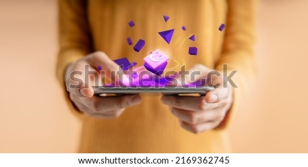 Metaverse, Web3 and Blockchain Technology Concepts. Closeup of Hand Using Smartphone for Connect a Community or Playing NFT Virtual Game Royalty-Free Stock Photo #2169362745