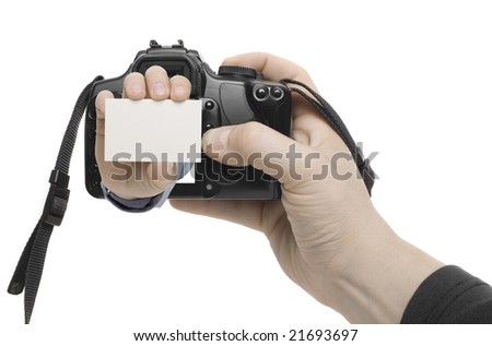 a hand reaches out of a digital camera