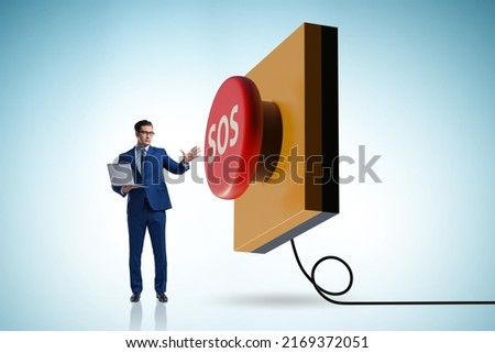 Businessman pressing SOS button in case of danger Royalty-Free Stock Photo #2169372051