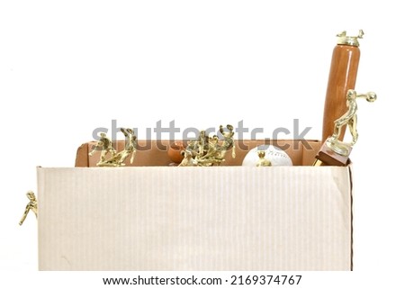 Box of Old Trophies Isolated On White