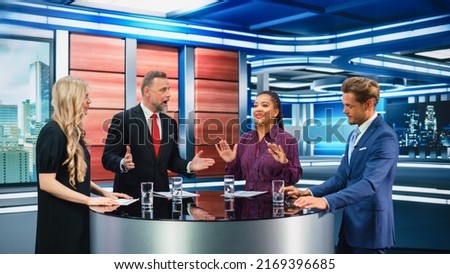 Talk Show TV Program: Four Diverse Specialists, Experts, Guests, Presenter, Host Discuss and Argue about Politics, Economy, Science, News. Mock-up Television Cable Channel Studio Debate Royalty-Free Stock Photo #2169396685