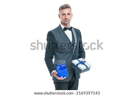 elegant grizzled man hold gift box isolated on white shopping