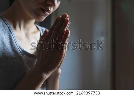woman Praying hands with faith in religion and belief in God. Namaste or Namaskar hands gesture, Pay respect, Prayer position. Royalty-Free Stock Photo #2169397753