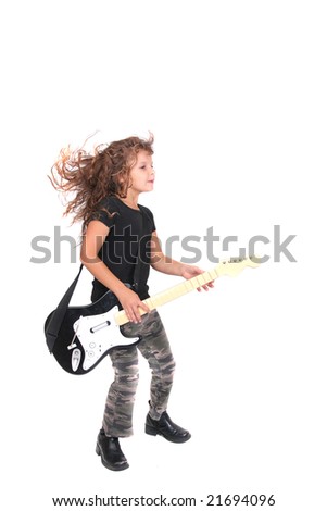 a young female child playing guitar like a rockstar over white